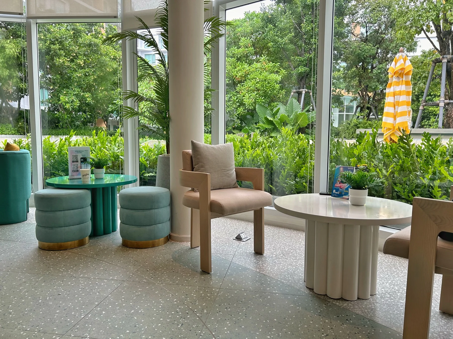 Shared lounge overlooking the tropical garden